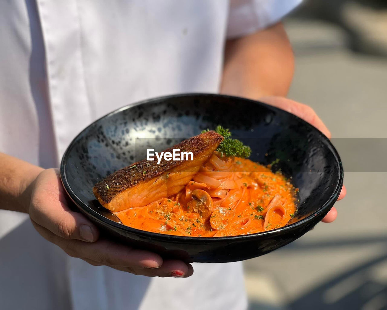 Midsection of man preparing food