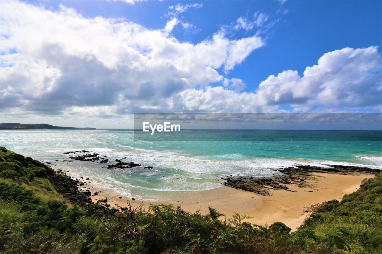 Scenic view of beach against sky