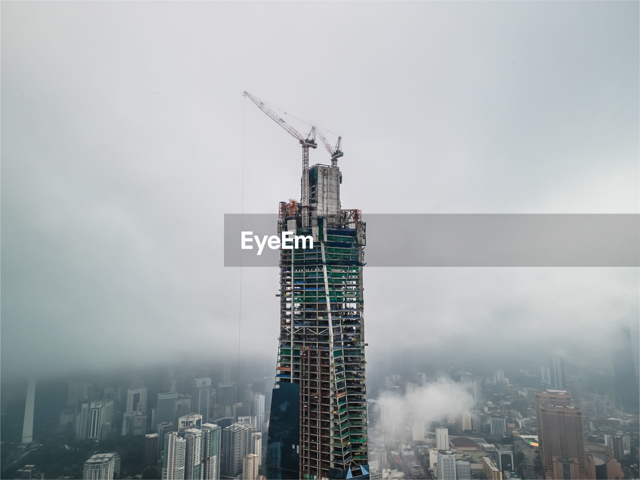 AERIAL VIEW OF MODERN BUILDINGS AGAINST SKY