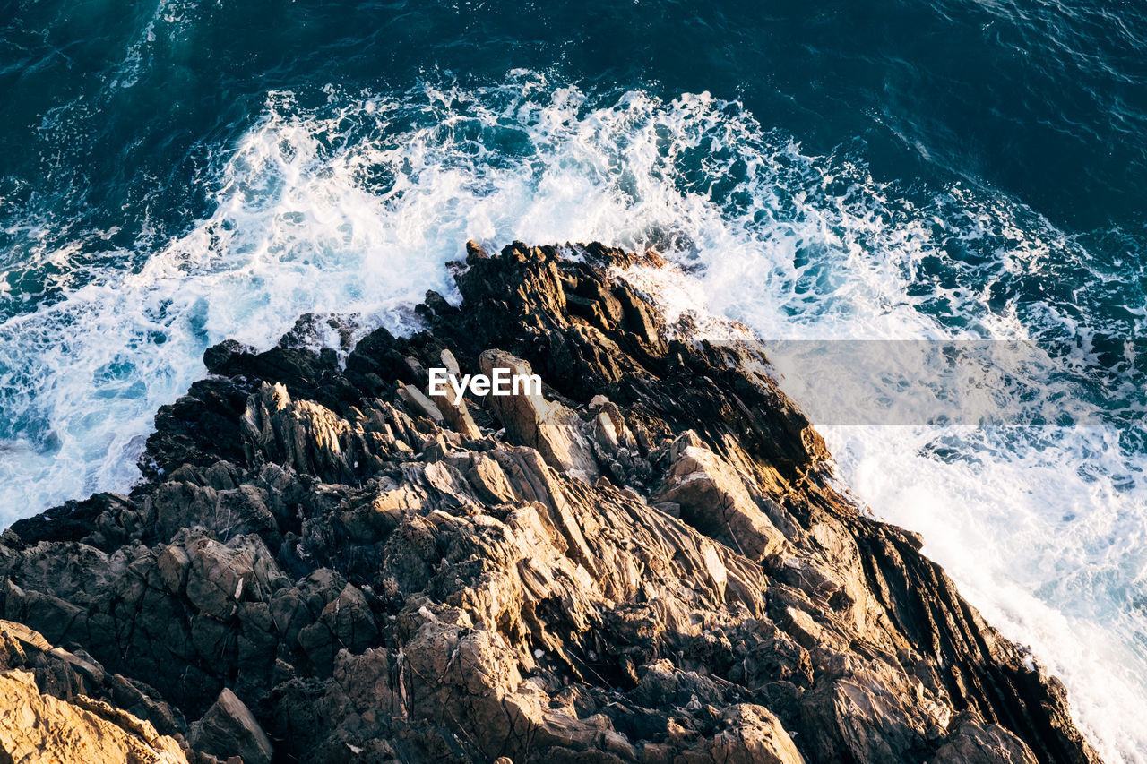 High angle view of rocks on beach