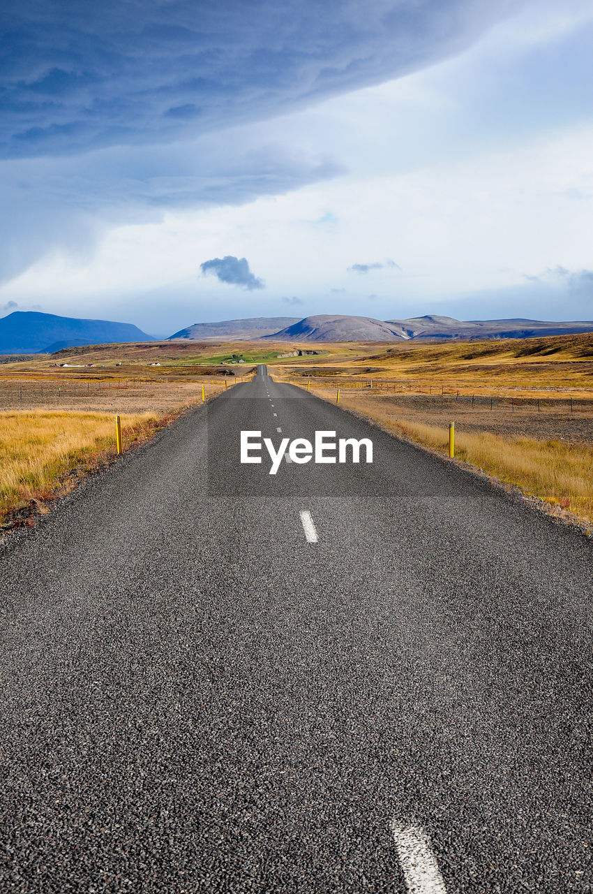 View of road against cloudy sky