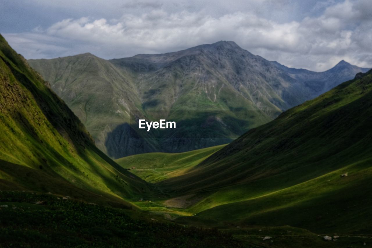 Scenic view of mountains against sky