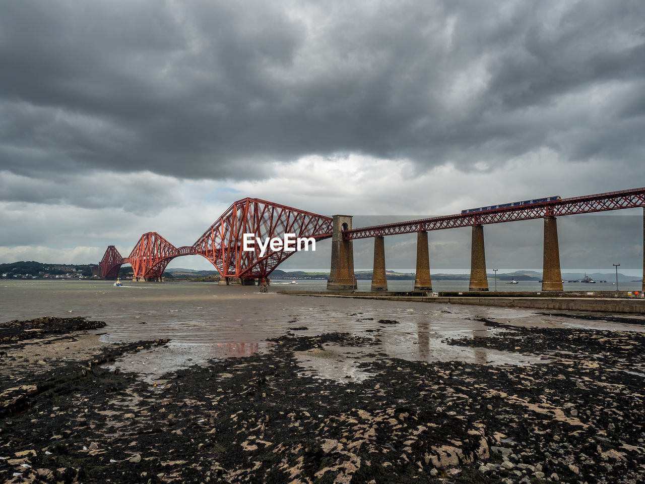 Golden gate bridge against cloudy sky