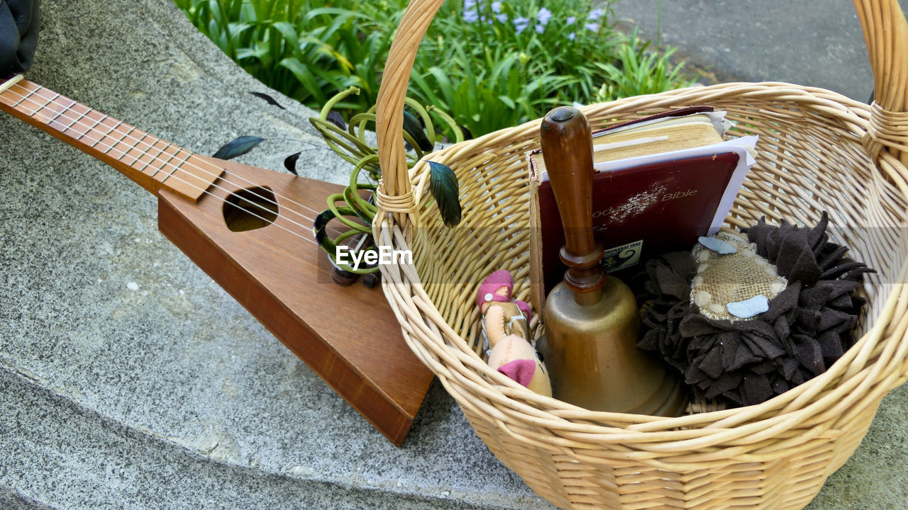 High angle view of guitar in basket