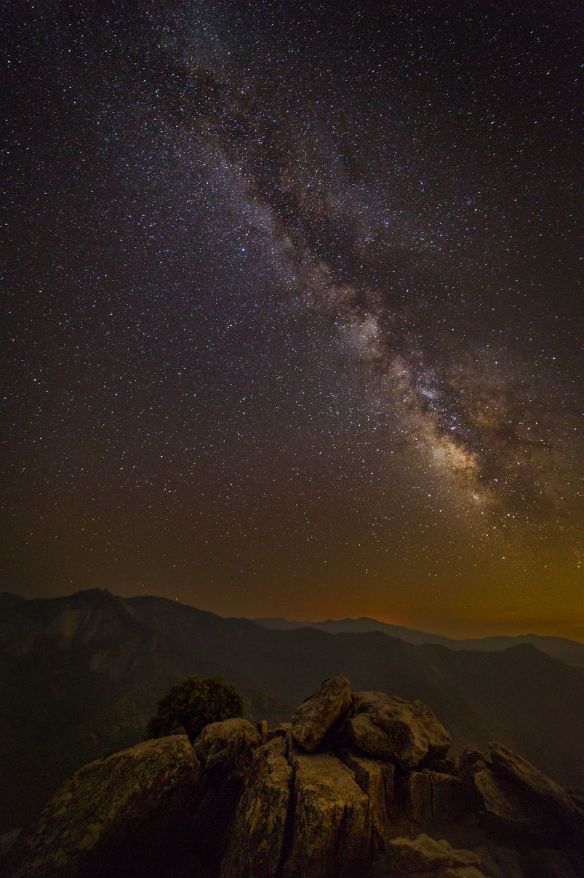 Scenic view of star field against sky at night