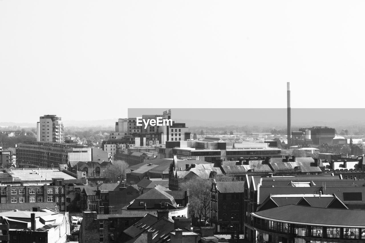 Cityscape against clear sky