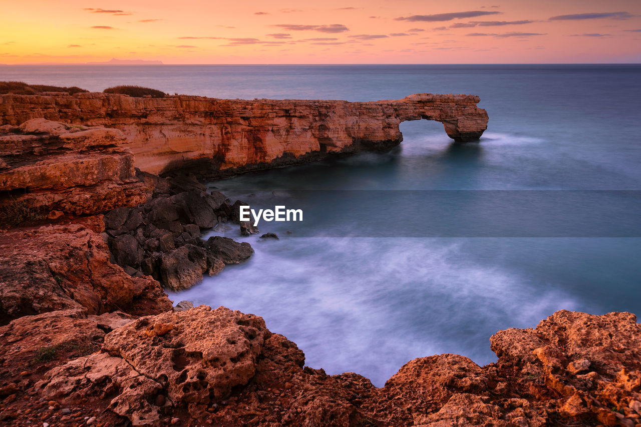 Limestone cliffs and a rock arch near lavris village near rethymno.