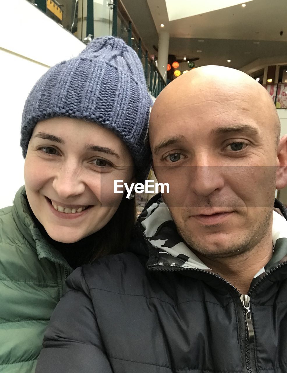 Close-up of smiling couple at restaurant