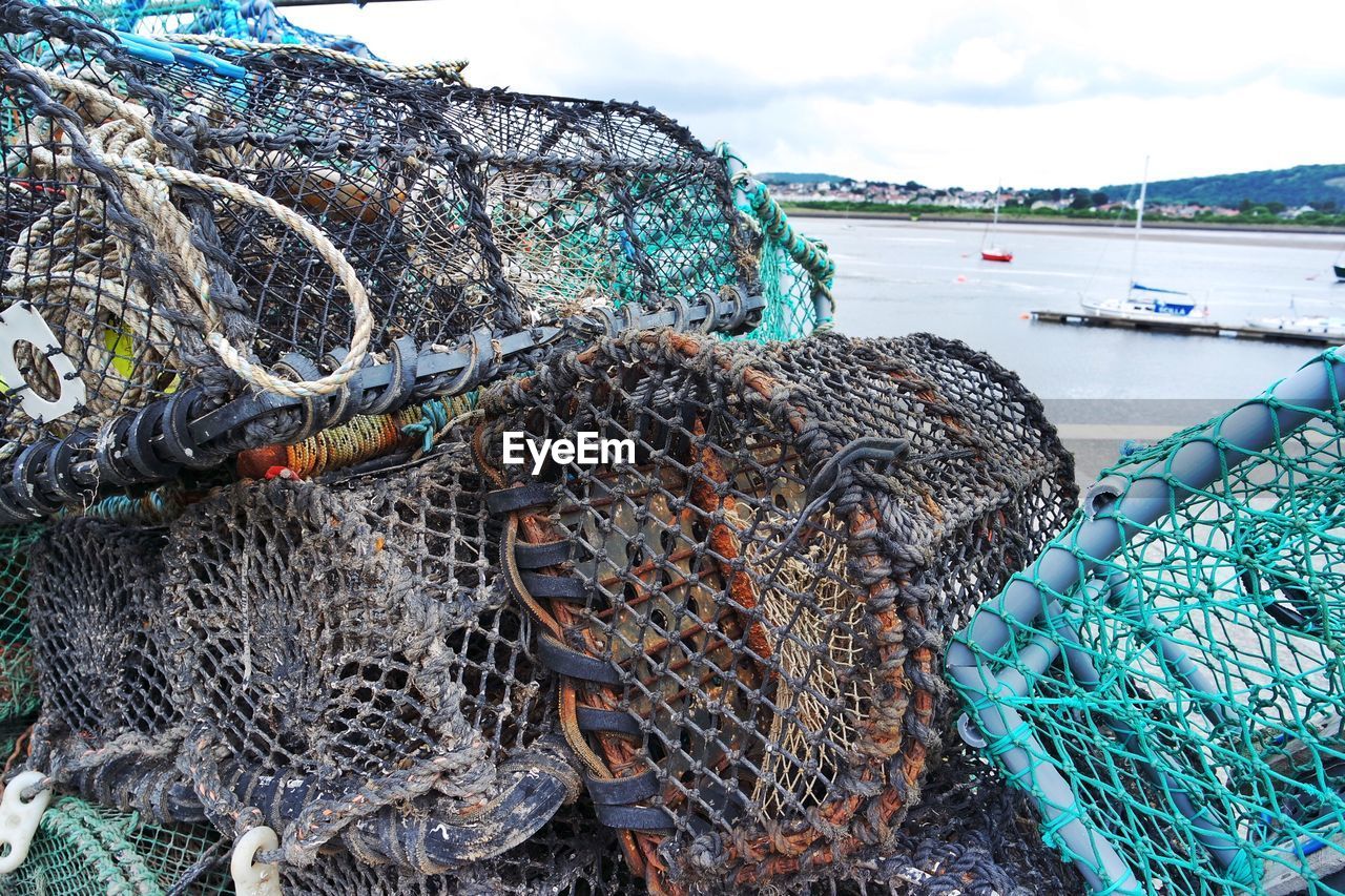 Stack of crab pots against lake