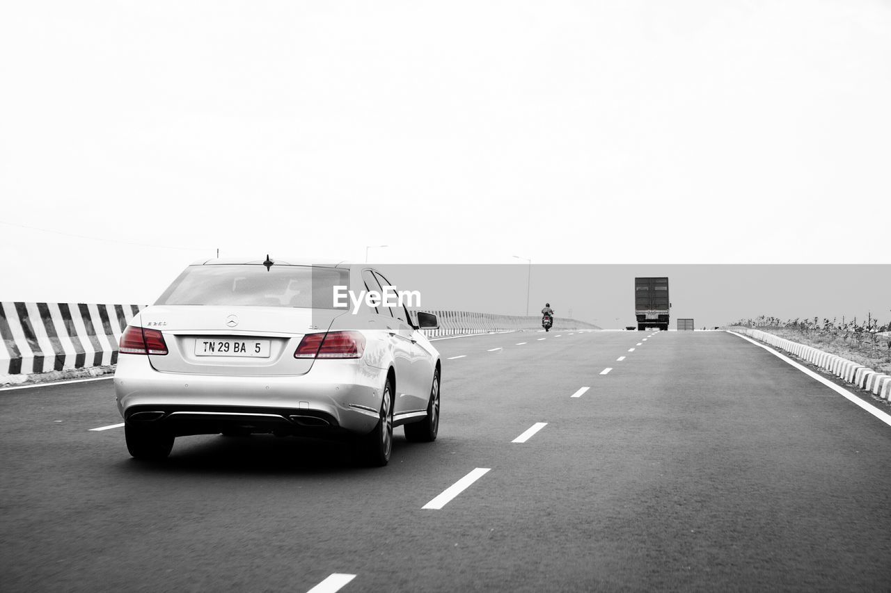 VIEW OF ROAD AGAINST CLEAR SKY