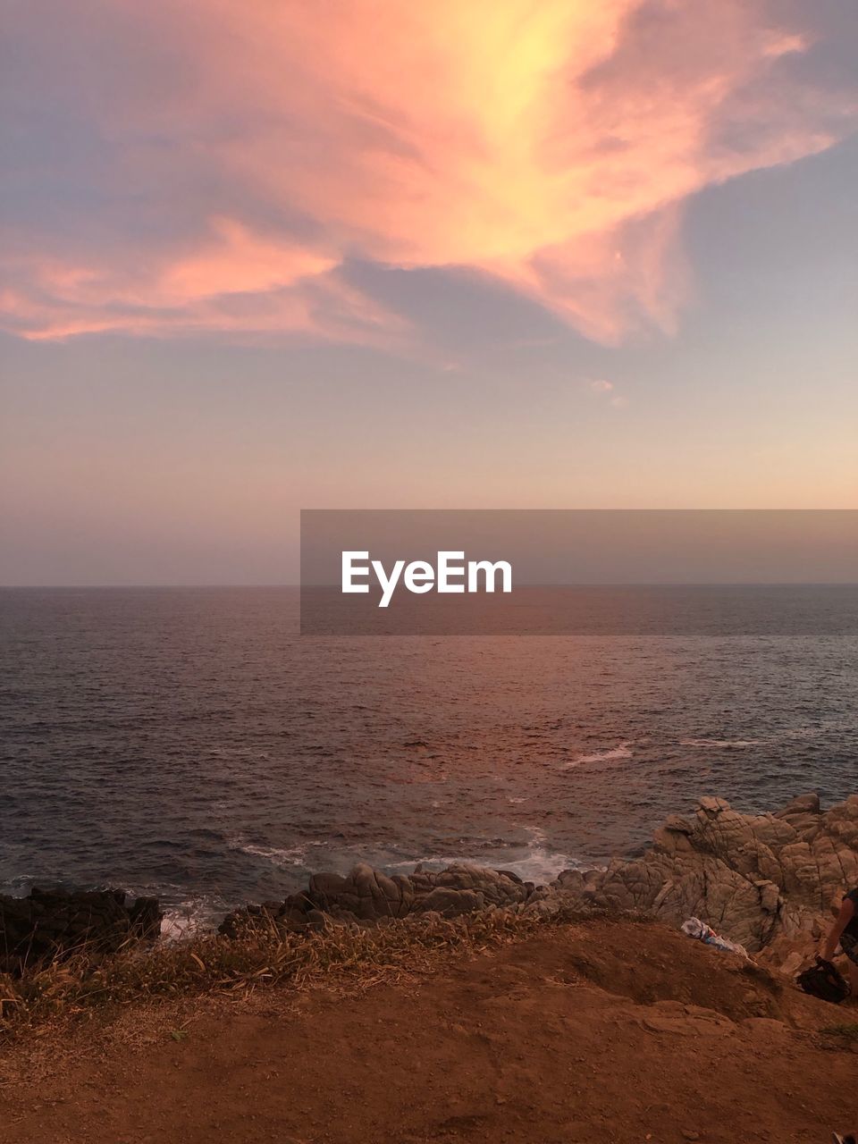 SCENIC VIEW OF SEA DURING SUNSET