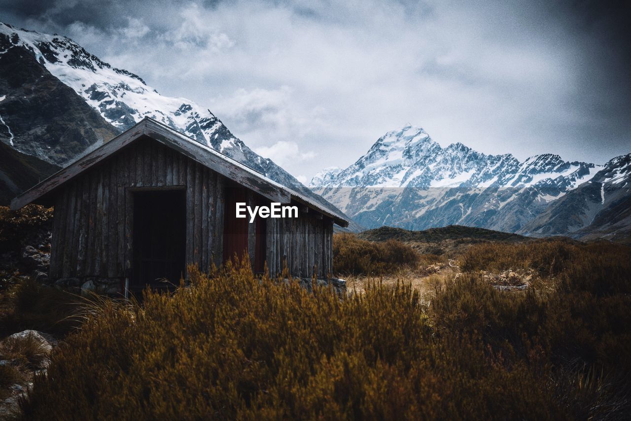 Scenic view of snow covered landscape against sky