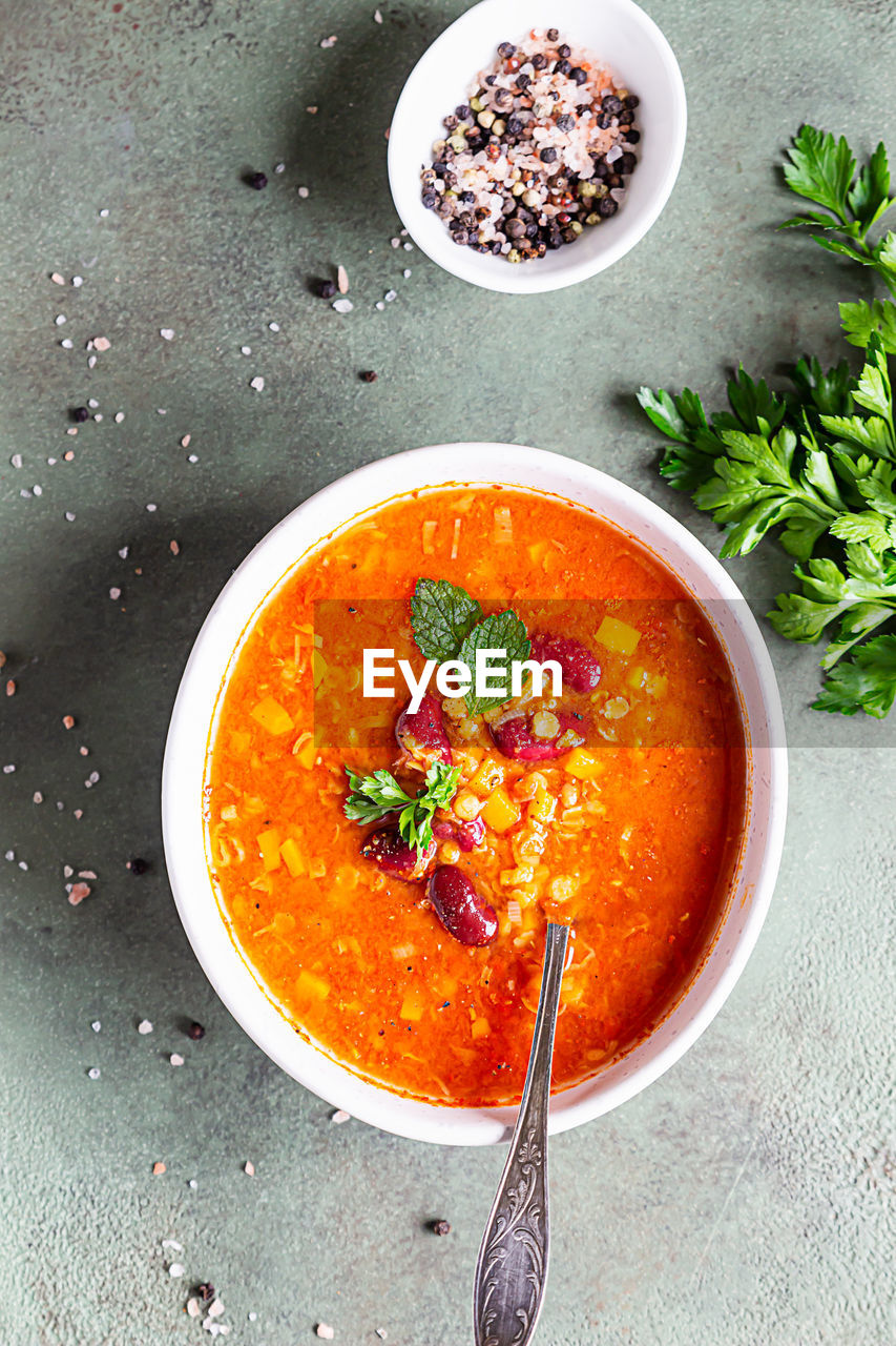 Hot and spicy, thick lentil and red bean soup with canned tomatoes and coriander. 