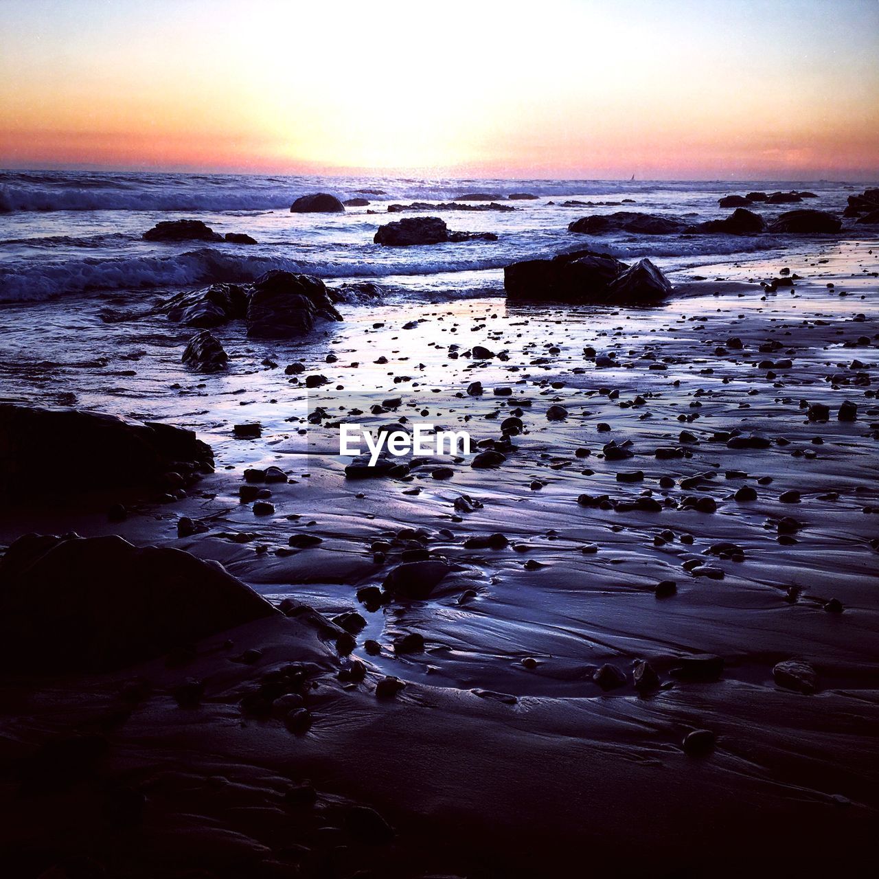 Scenic view of sea against sky during sunset