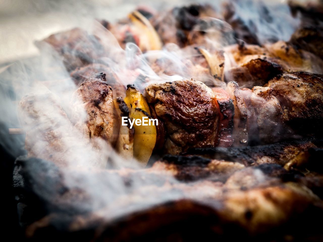 Close-up of meat on barbecue grill