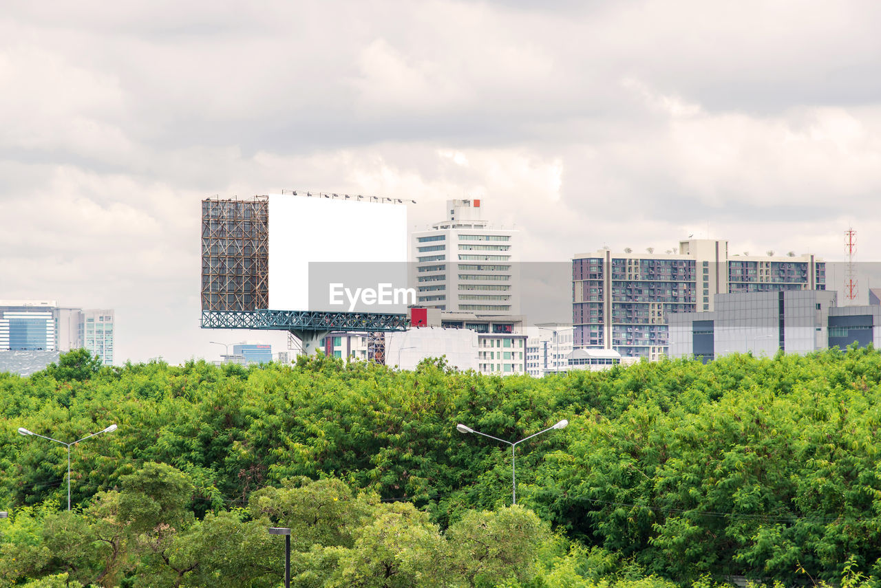 MODERN BUILDINGS AGAINST SKY