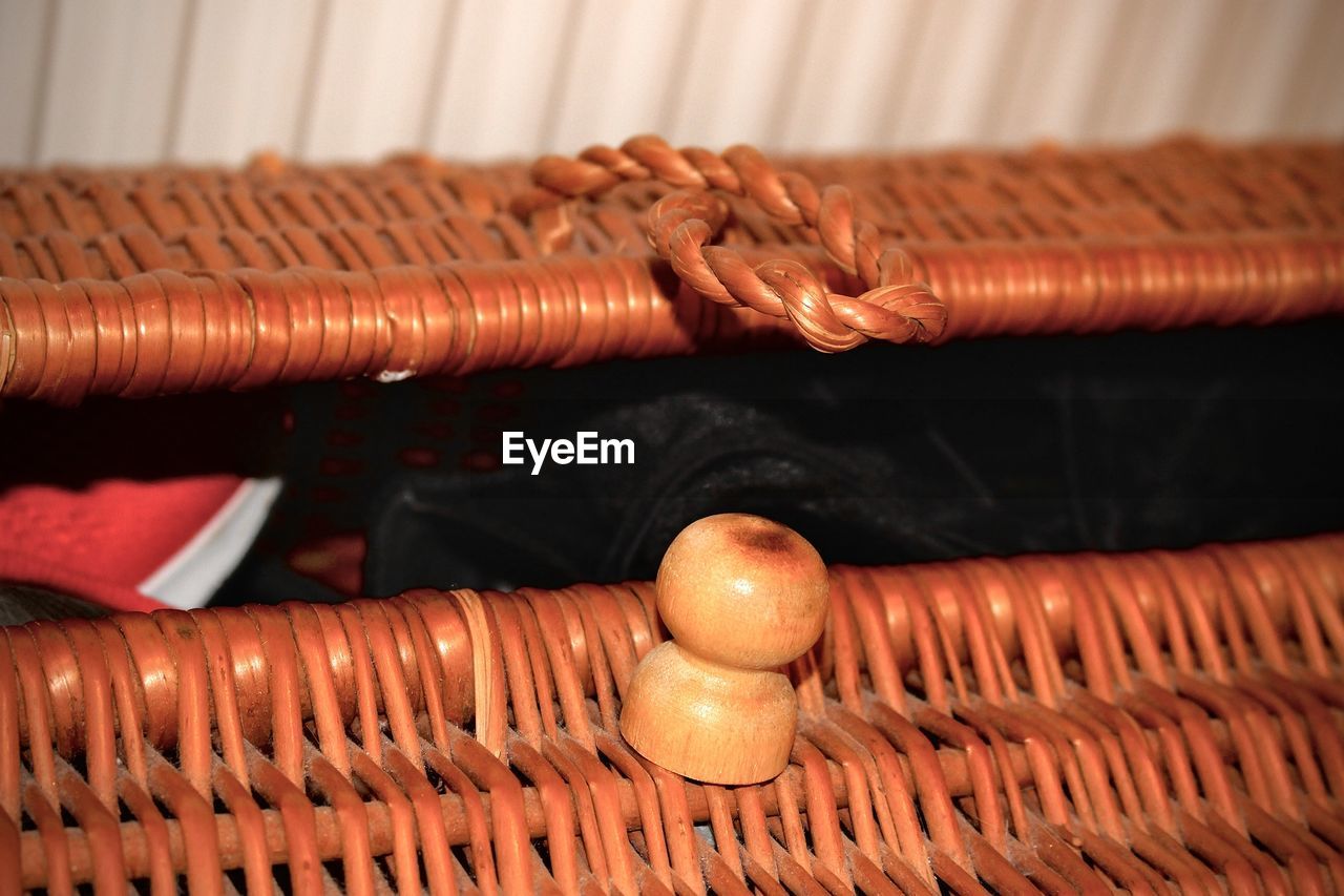 High angle view of shoes in wicker basket