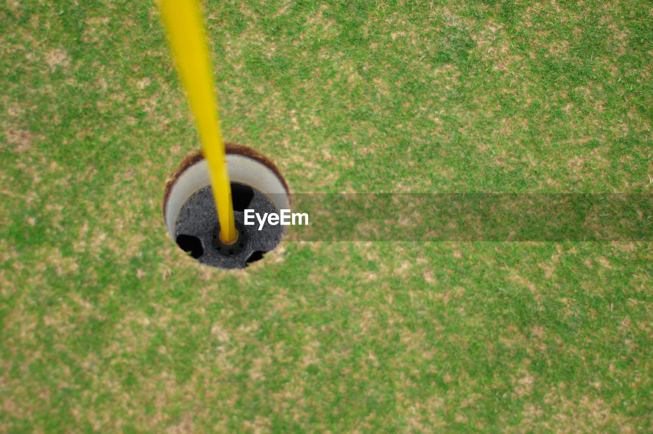 High angle view of flagpole on golf course