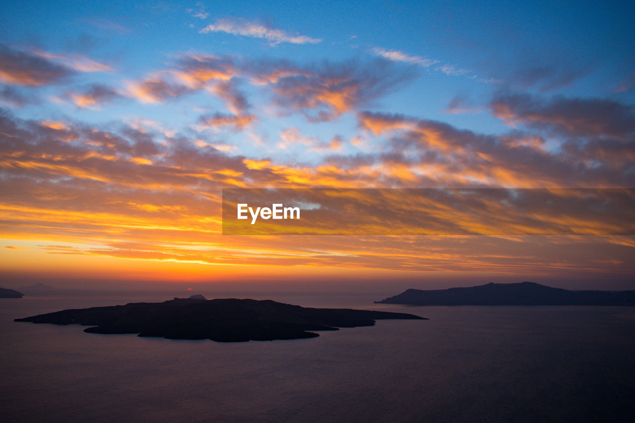 SCENIC VIEW OF SEA DURING SUNSET