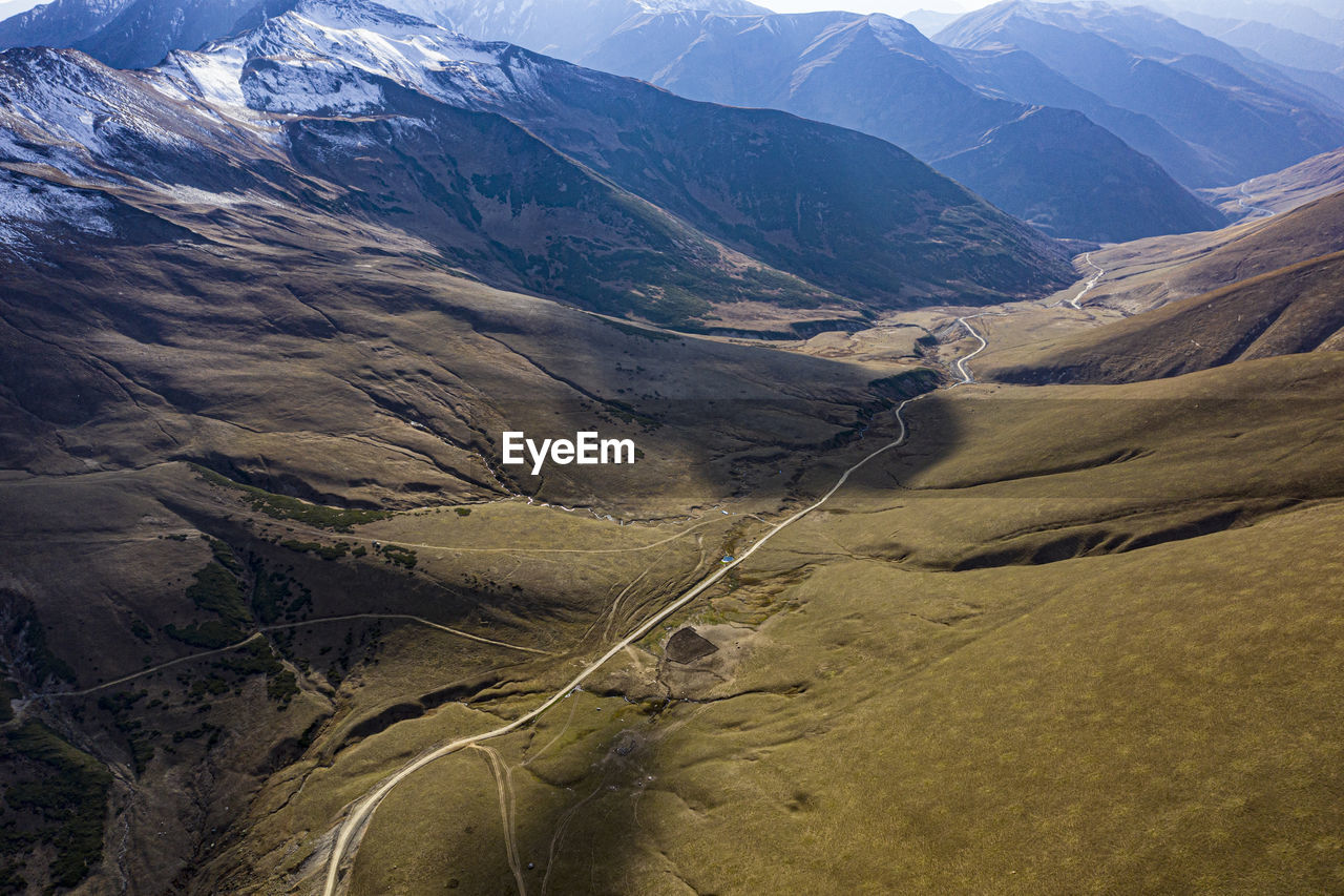 HIGH ANGLE VIEW OF MOUNTAINS