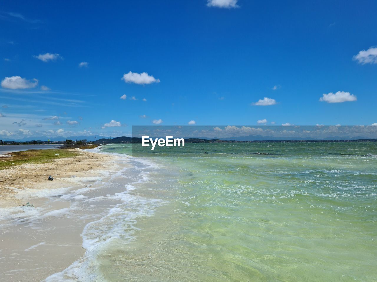 VIEW OF BEACH AGAINST SKY