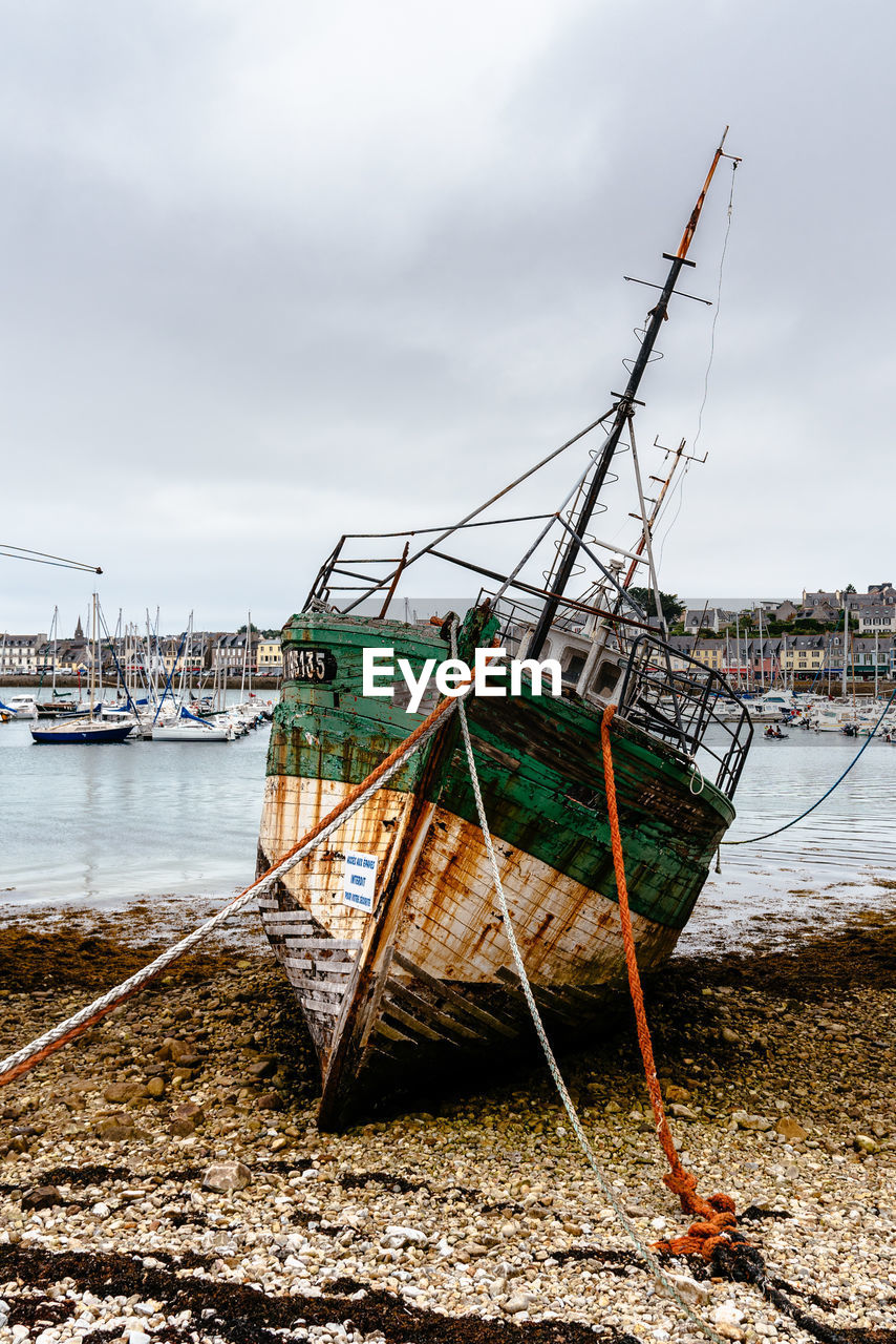 VIEW OF FISHING BOAT ON BEACH