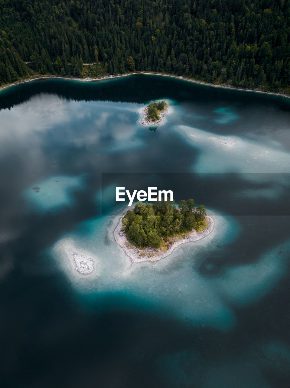 High angle view of island in blue lake