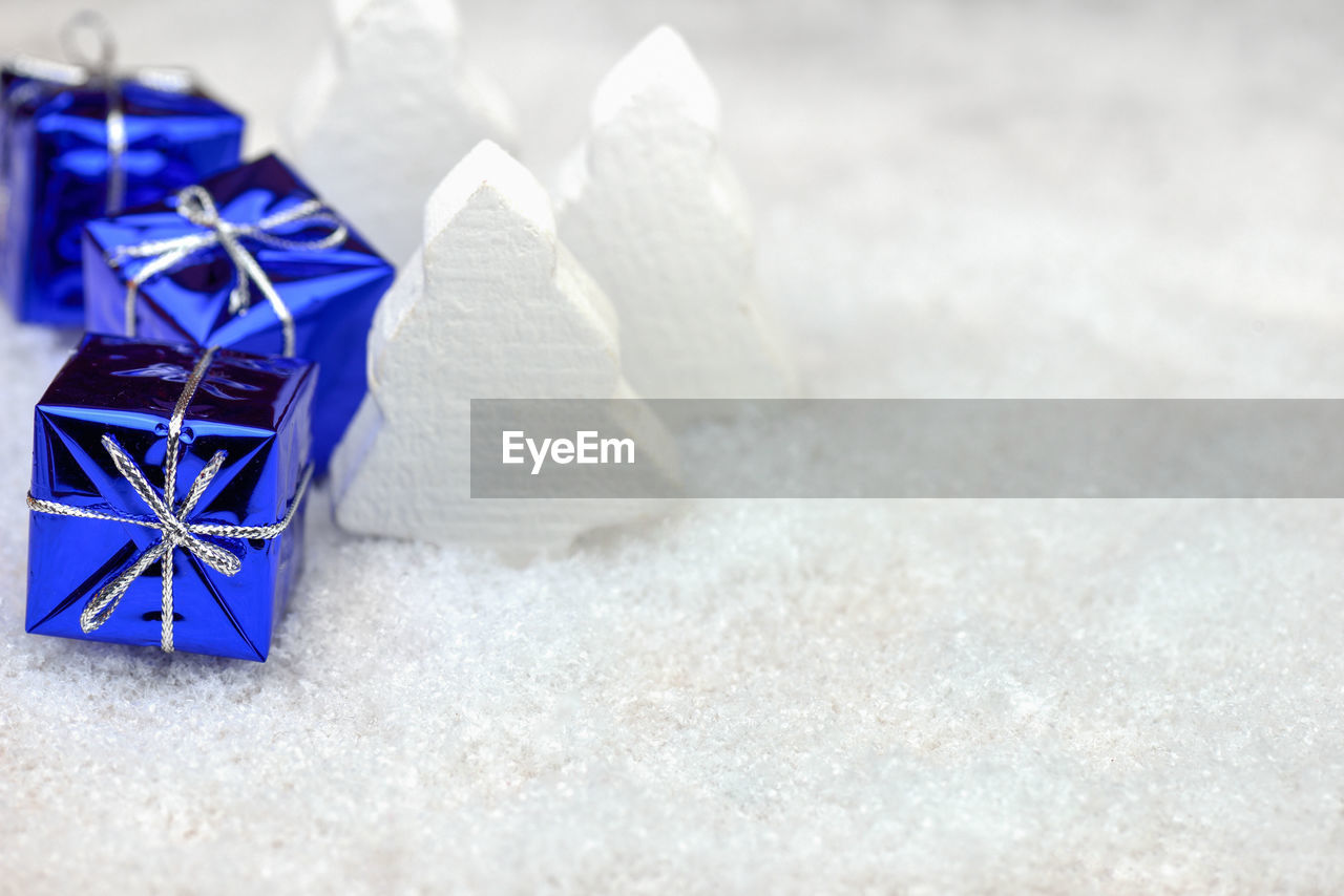 Close-up of christmas decoration on snow