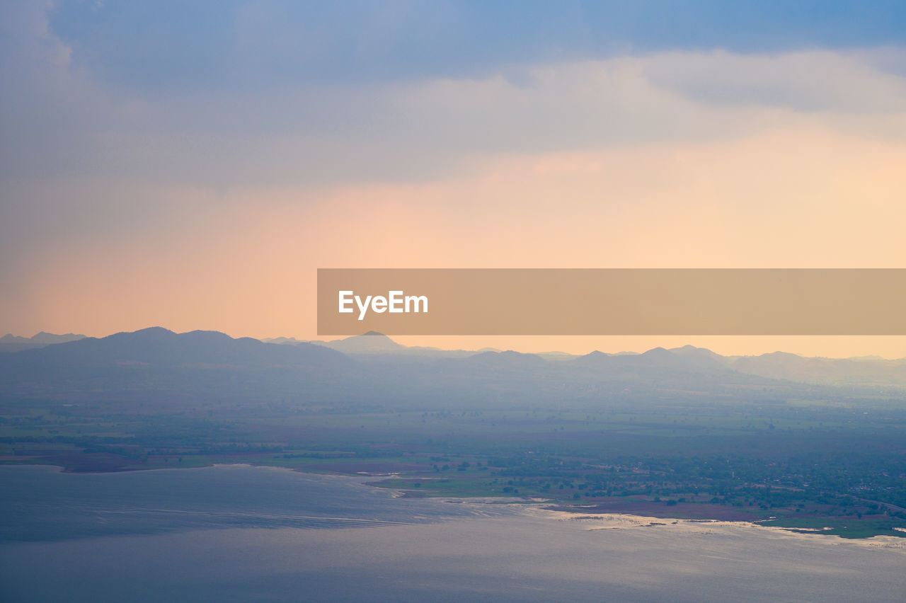 Scenic view of landscape against sky during sunset