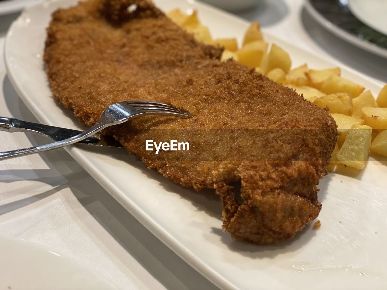 High angle view of meat in plate on table