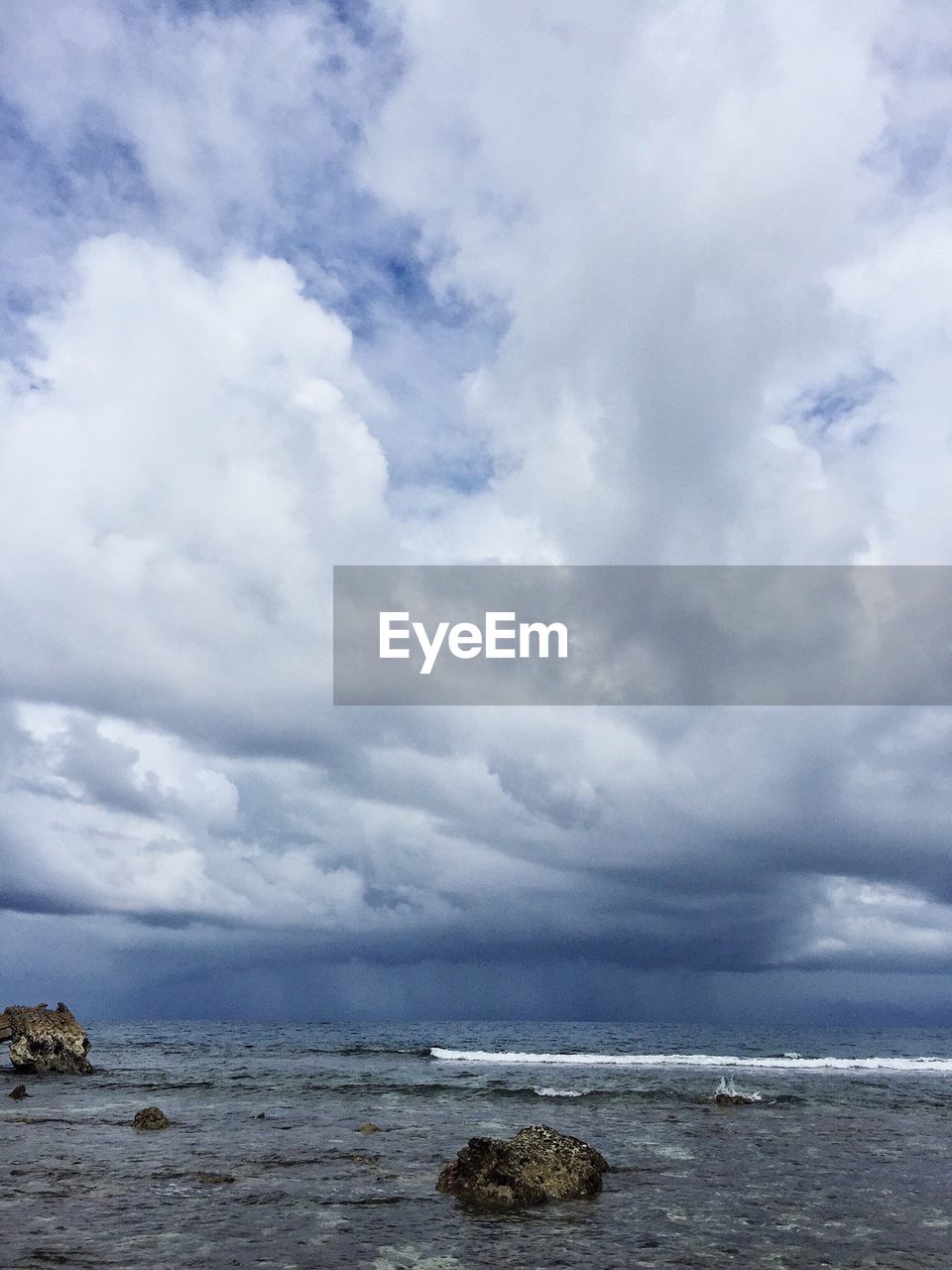 Scenic view of sea against cloudscape