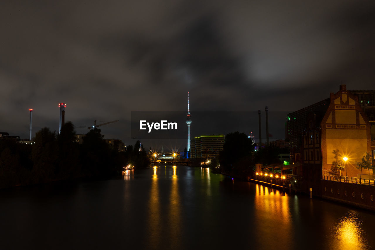 Illuminated buildings in city at night