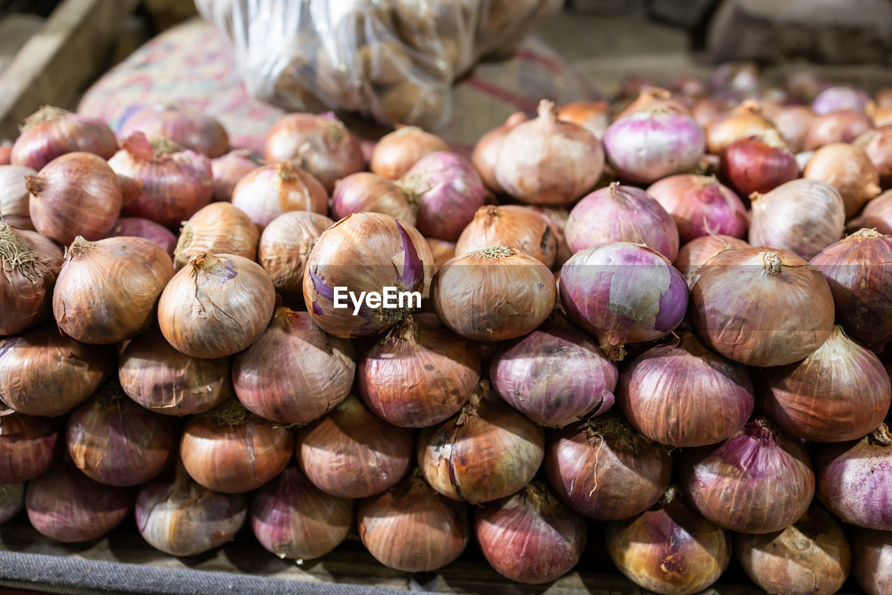 Fresh onion from farm at vegetable store for sale at evening