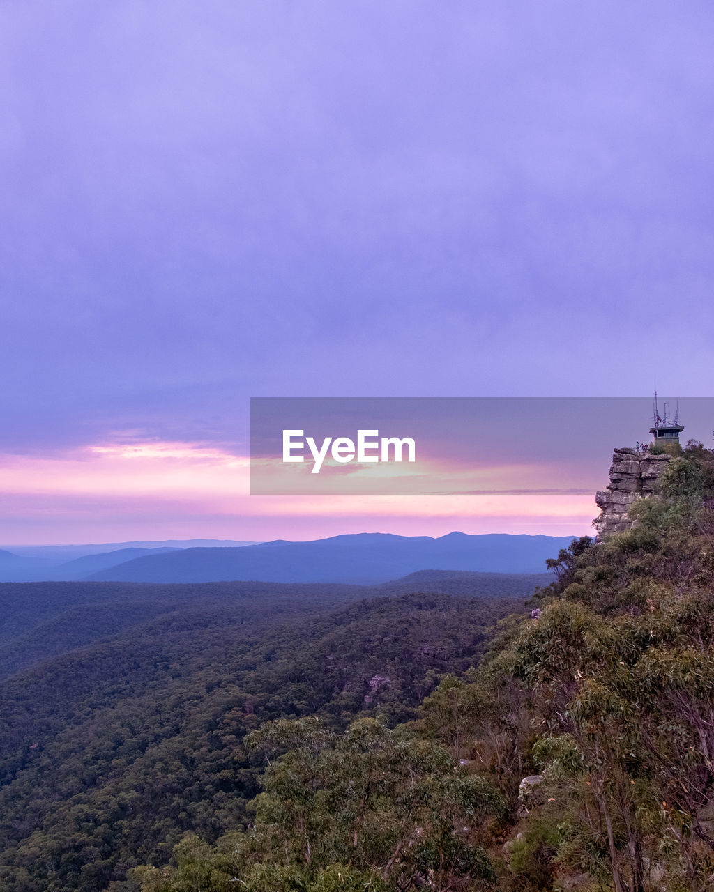 Scenic view of landscape against sky during sunset