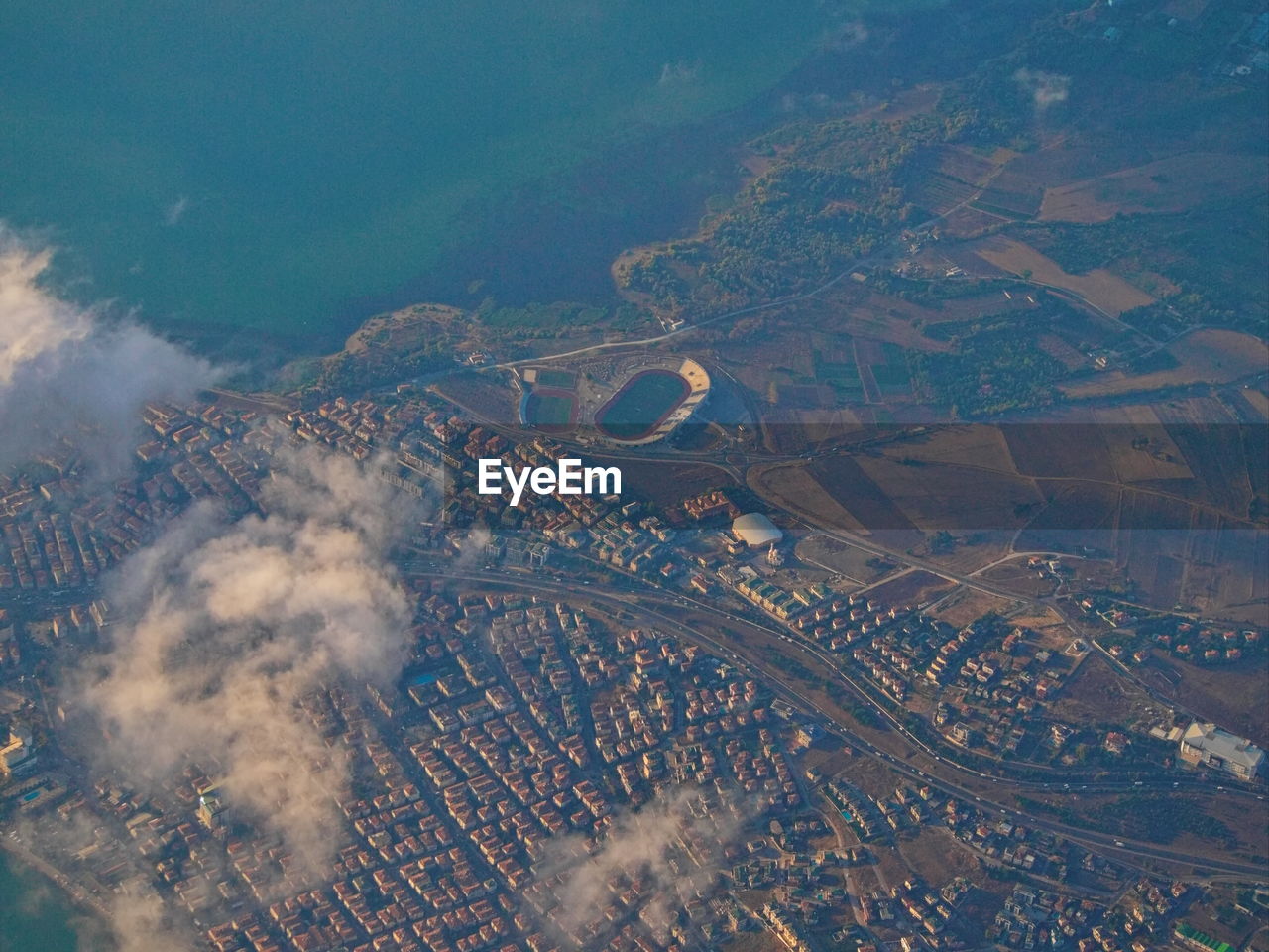 Aerial view of cityscape and sea