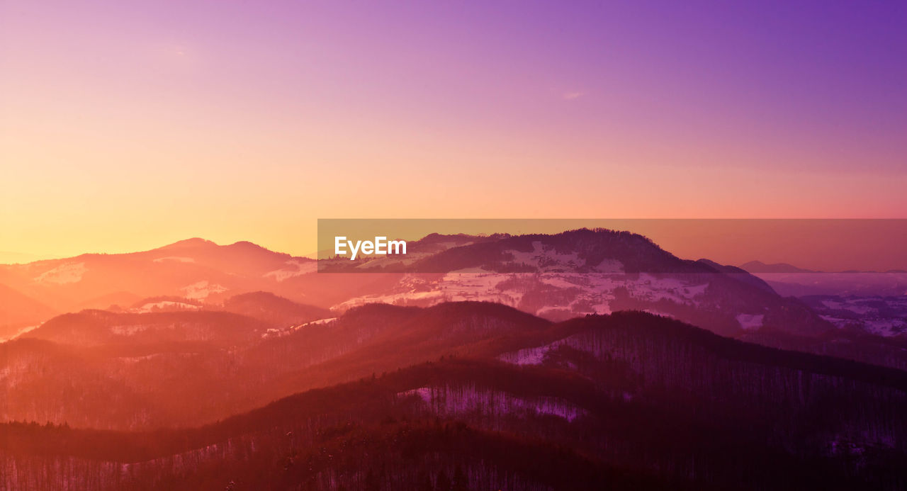 Scenic view of mountains during sunset