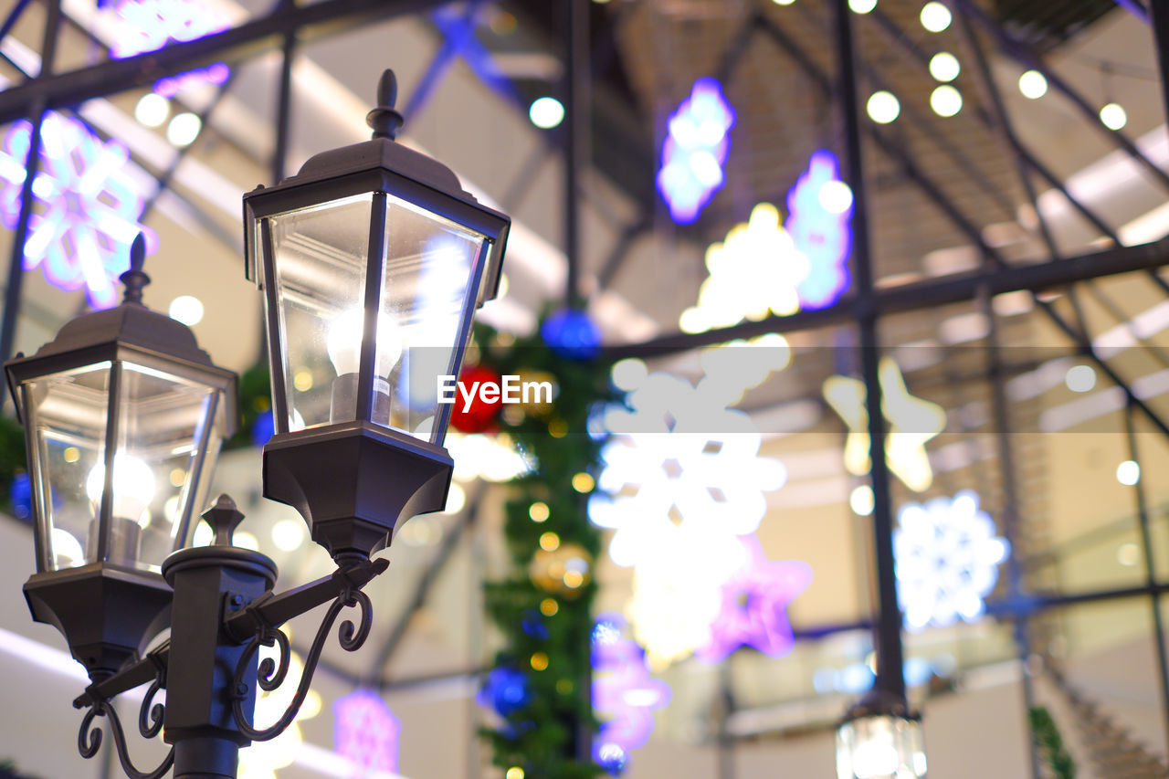 Low angle view of illuminated street light