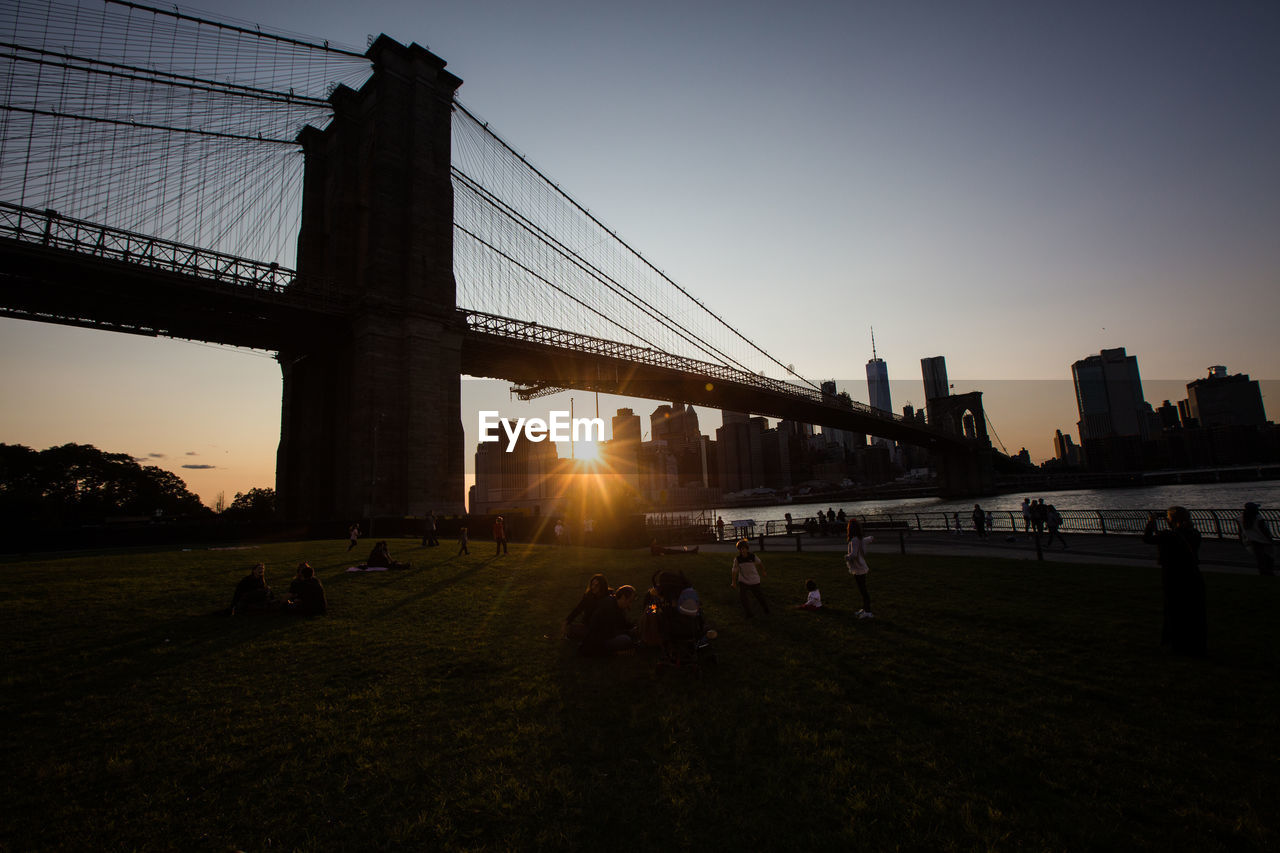 VIEW OF SUSPENSION BRIDGE AT SUNSET