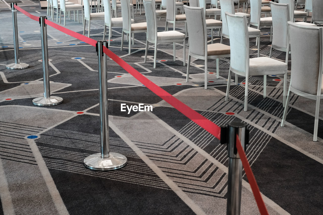 High angle view of empty chairs in banquet hall