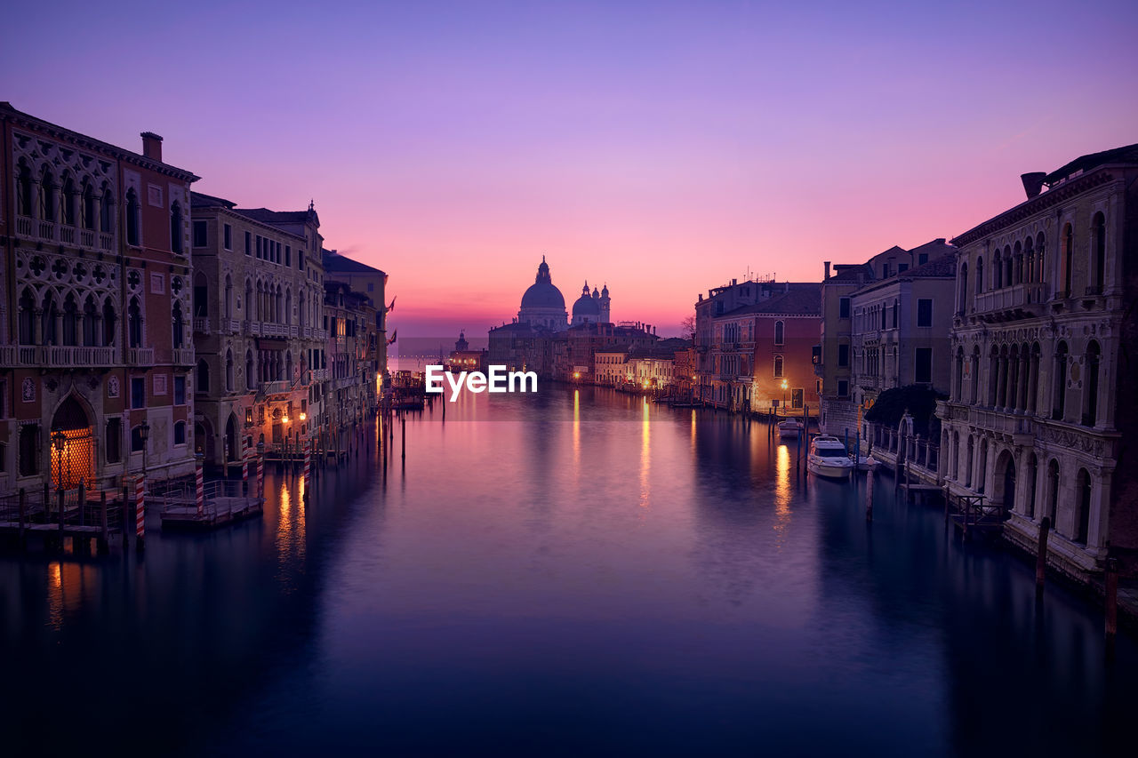 View of buildings at sunset