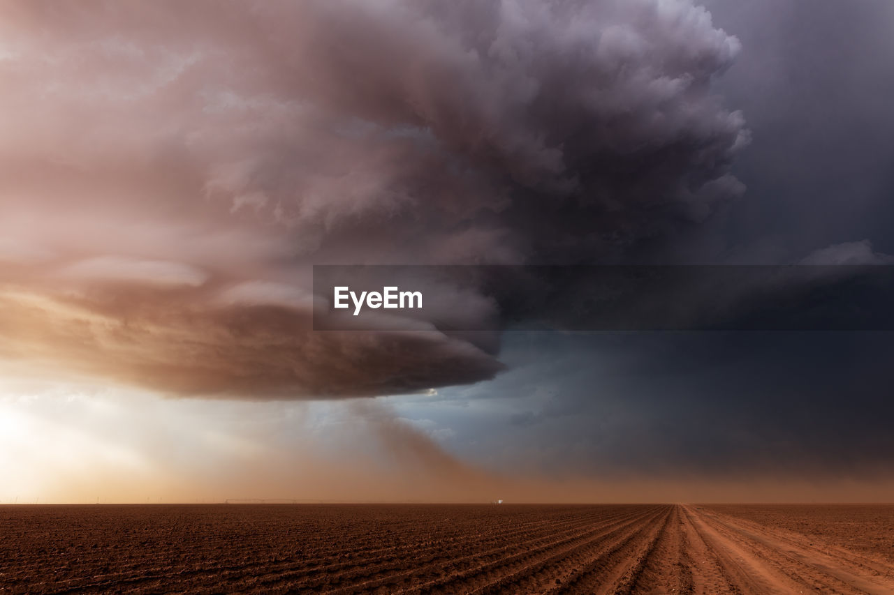 Dramatic supercell storm clouds over a field near lubbock, texas