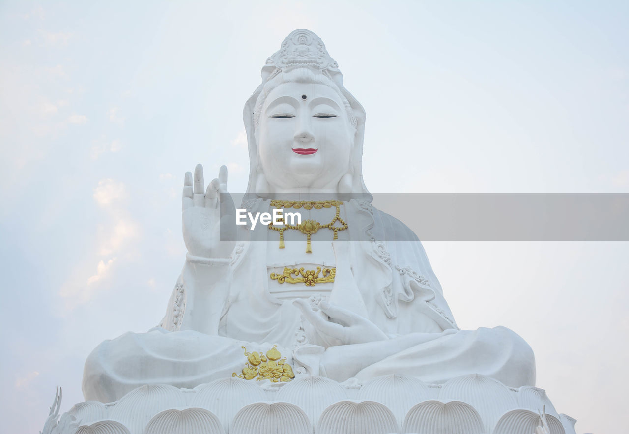 Beautiful white statues of the ancient guanyin are large