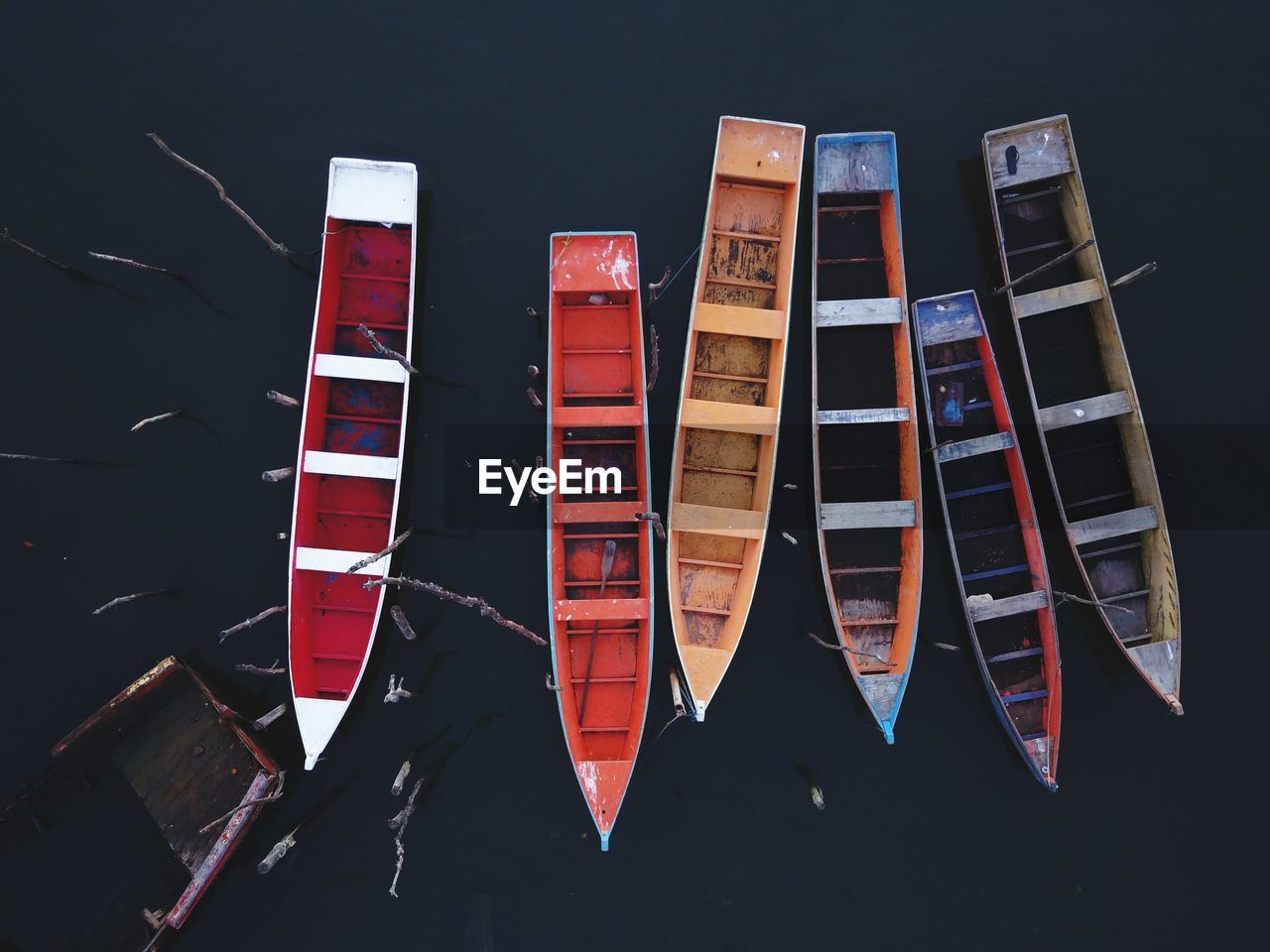 High angle view of boats moored on lake