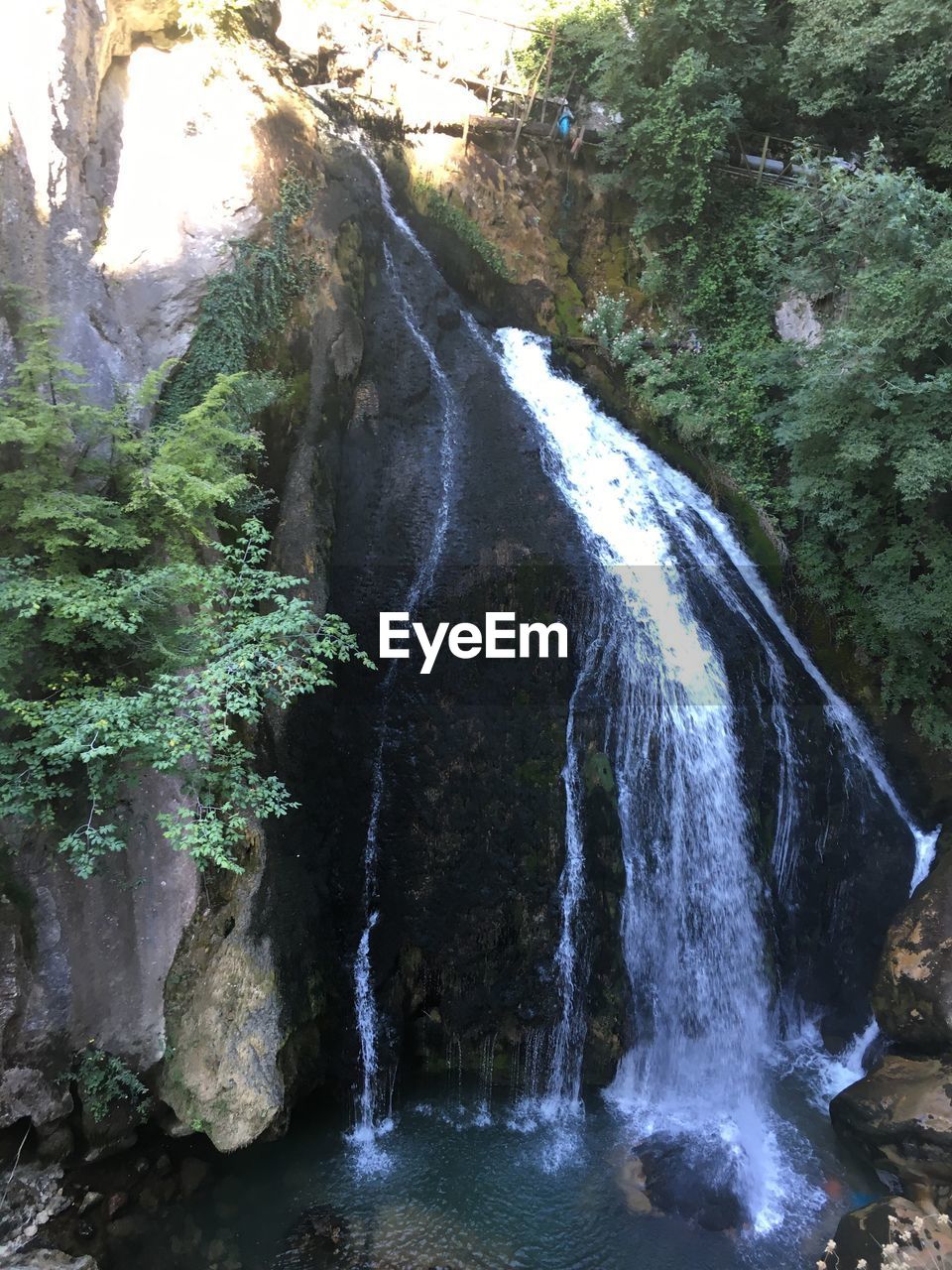 SCENIC VIEW OF WATERFALL