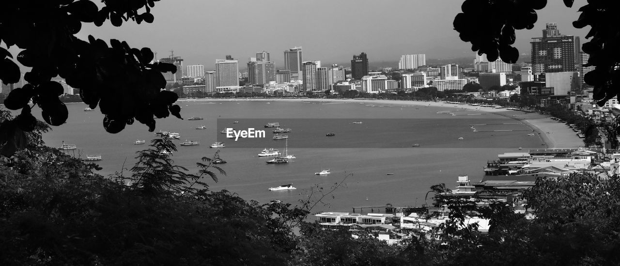 HIGH ANGLE VIEW OF BUILDINGS AGAINST SKY