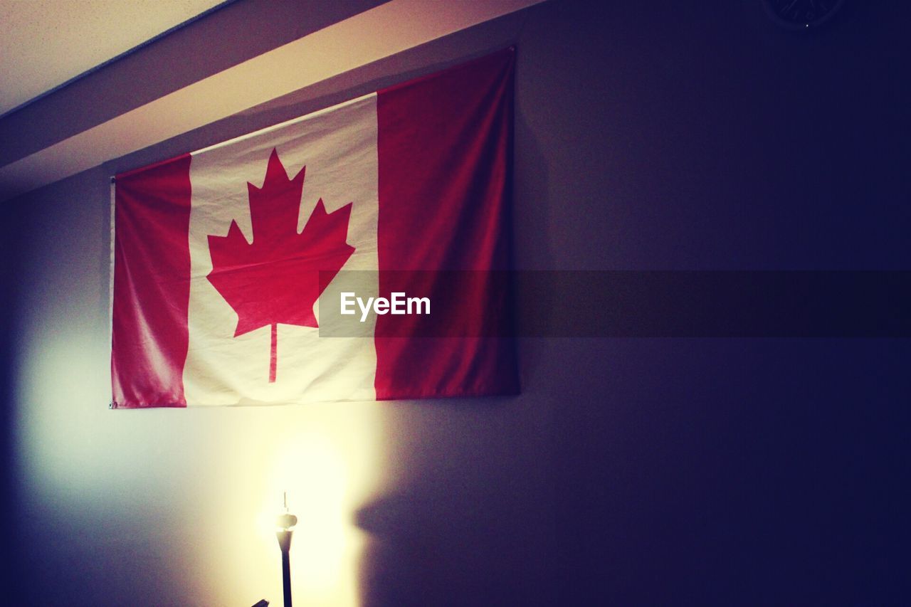 Canadian flag in illuminated house