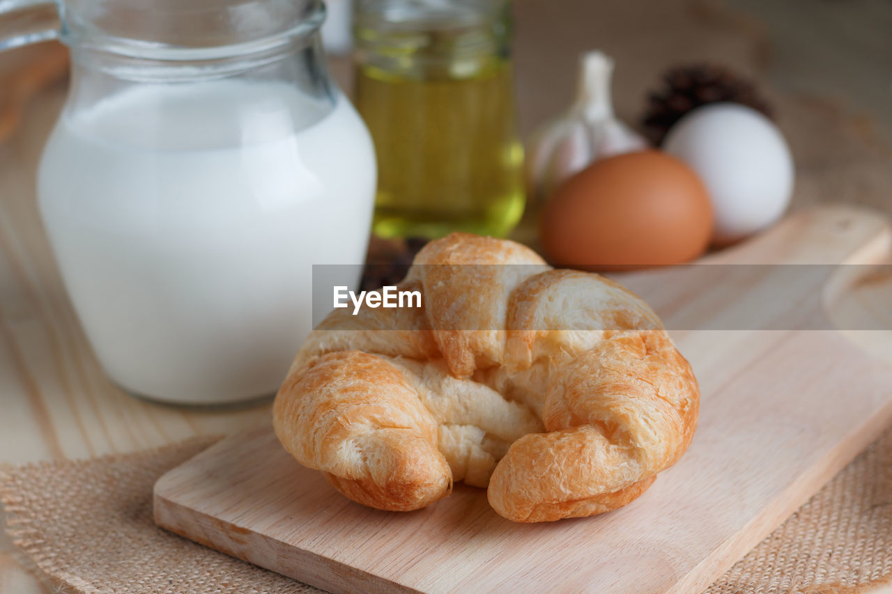 Close-up of croissant on table