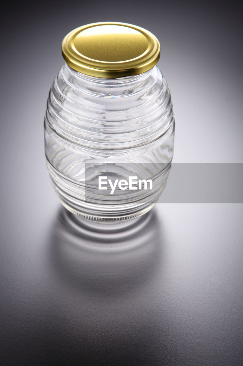 High angle view of empty glass jar on table