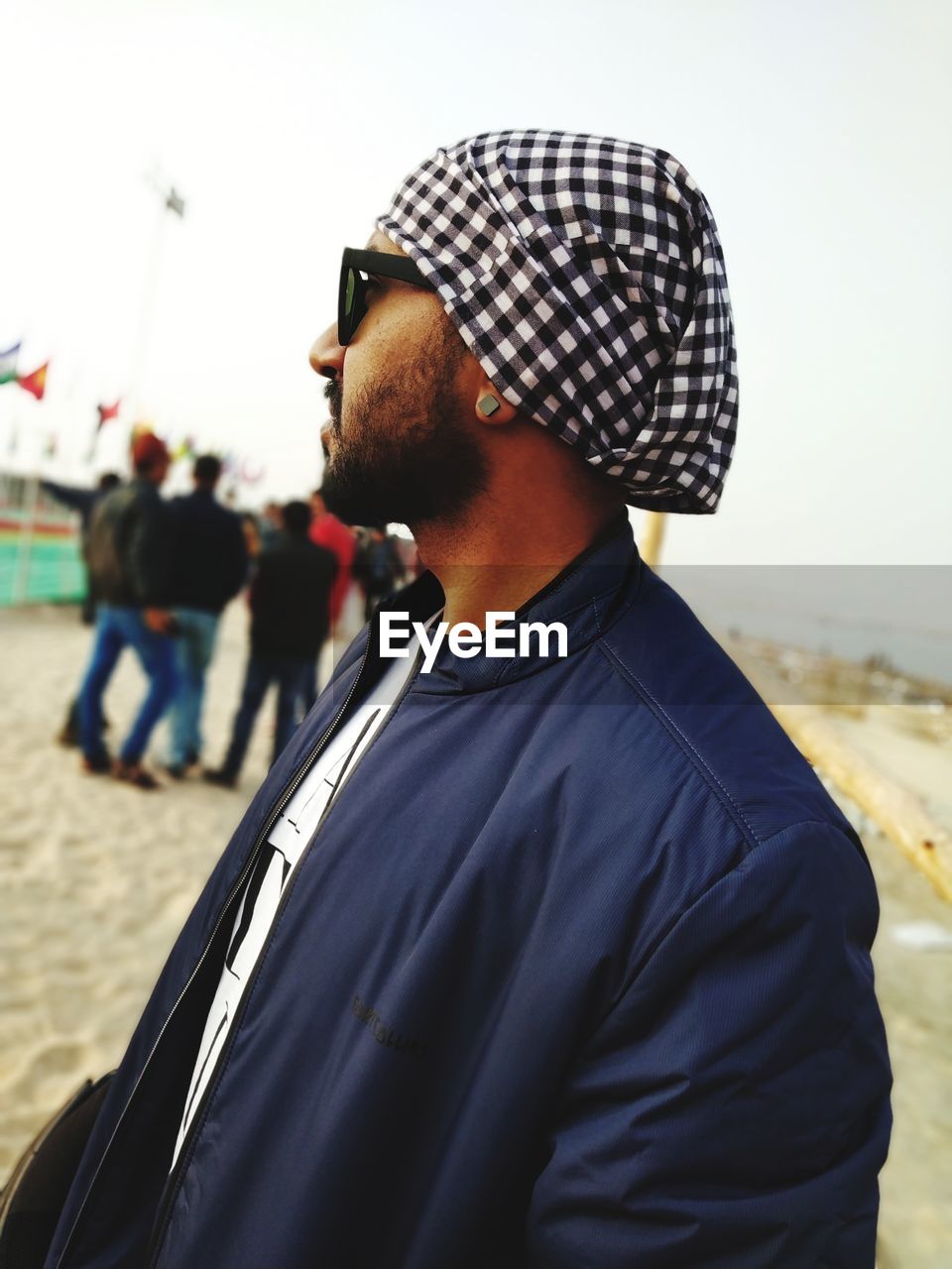 Young man wearing beanie and jacket