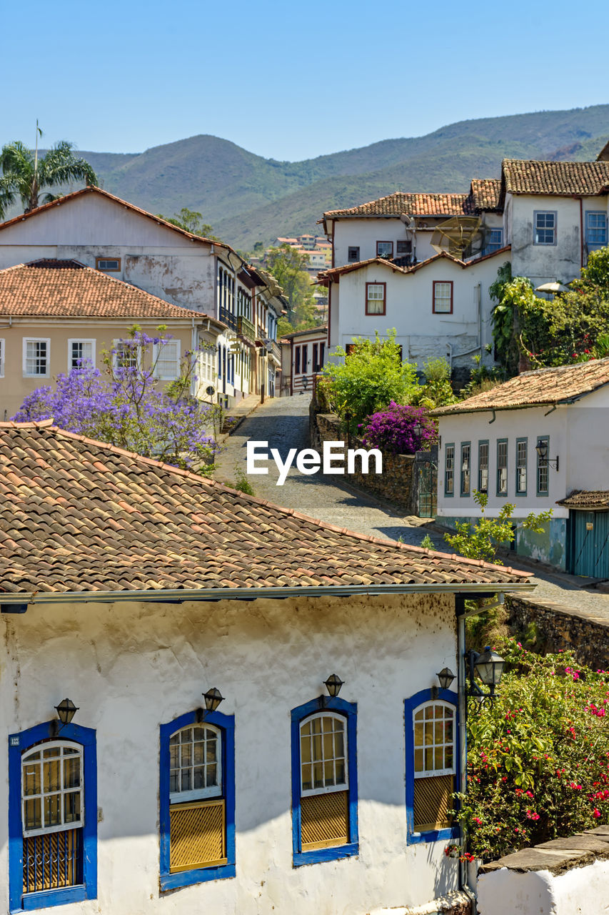 Old street with colonial style houses at ouro preto city